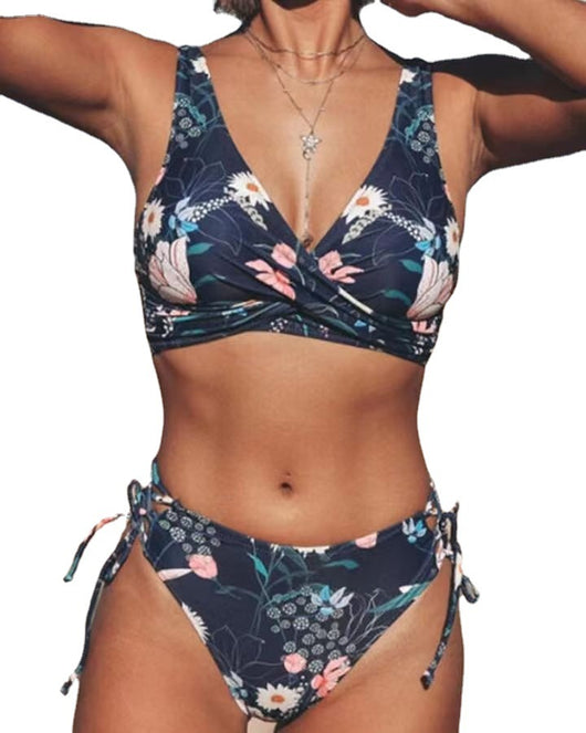 Navy blue floral print bikini with a twisted V-neck top and high-cut bottoms with adjustable tie sides. - Image 3