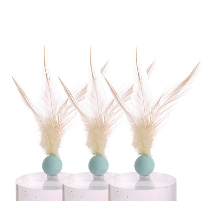 Three cat toys with pink balls and natural beige feathers, displayed on clear stands against a white background. - Image 15