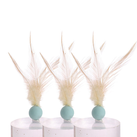 Three cat toys with pink balls and natural beige feathers, displayed on clear stands against a white background. - Image 15