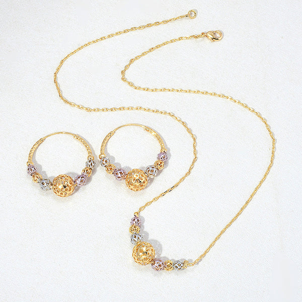 Multicolor cutout round beads necklace and matching hoop earrings set with gold, silver, and purple beads.
