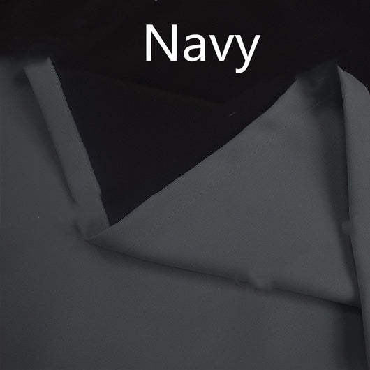 Close-up of a navy blue blackout curtain, showcasing the fabric texture and the black lining on the back. - Image 7