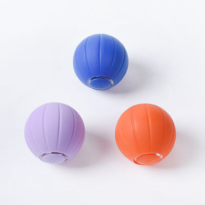 Orange smart bouncing rolling silicone ball toy for cats, shown with its white packaging box and a white USB charging cable. - Image 4