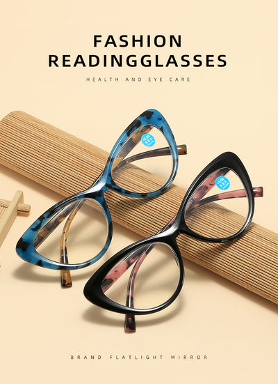 Black cat-eye anti-blue light reading glasses with green patterned temples on a white background. - Image 11