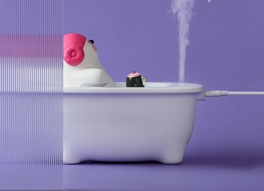 Creative air humidifier shaped like a white bathtub with a polar bear wearing pink earmuffs and a small penguin. - Image 9