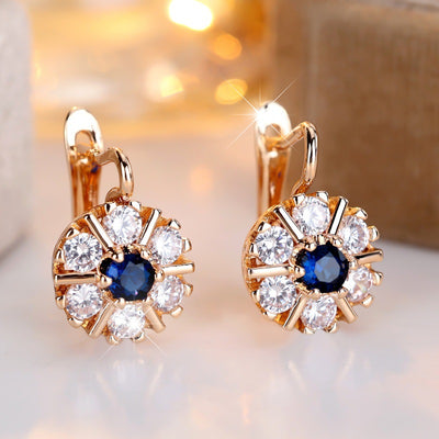 Aretes Flor de Zirconia Blanca y Zafiro Azul