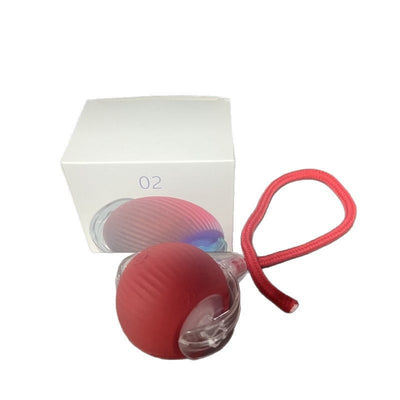 Gray intelligent automatic cat teasing ball with a clear section and braided cord, next to its white product box. - Image 5