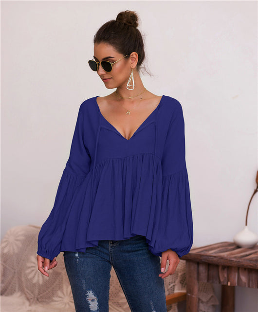 Blusa V-Neck con Mangas Abullonadas en Colores Sólidos