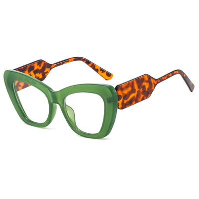 Pink cat-eye sunglasses with green temples and brown to pink gradient lenses on a white background. - Image 10
