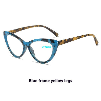 Black cat-eye anti-blue light reading glasses with green patterned temples on a white background. - Image 6