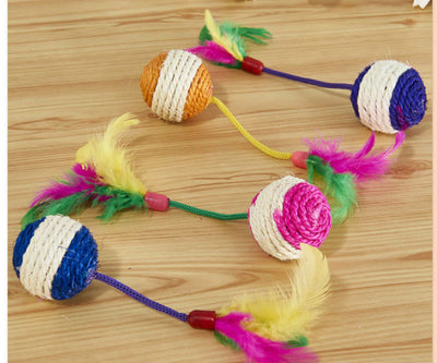 Four sisal ball cat toys with colorful feathers in pink, purple, blue, and teal stripes, for playing and grinding claws. - Image 7