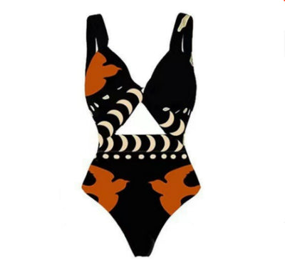 Black one-piece swimsuit with an asymmetrical top and matching long skirt, featuring a tropical palm tree and bird print. - Image 21