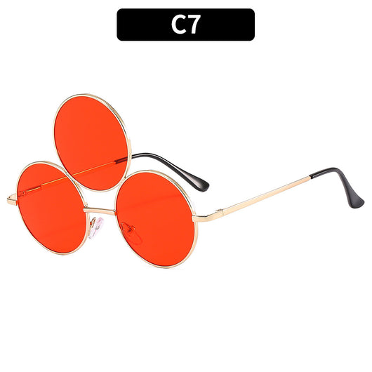 Red lens round sunglasses with a gold metal frame and an extra small round lens above the left eye. - Image 8