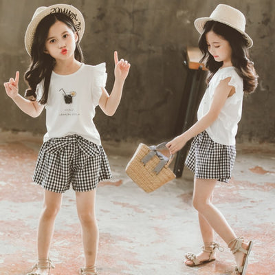 Conjunto Infantil Niña Estilo Coreano: Blusa Manga Corta y Short a Cuadros con Moño - Image 21