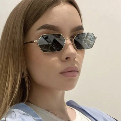 Women's polygonal sunglasses with gold frames and brown lenses, featuring a unique hexagonal shape. - Image 10