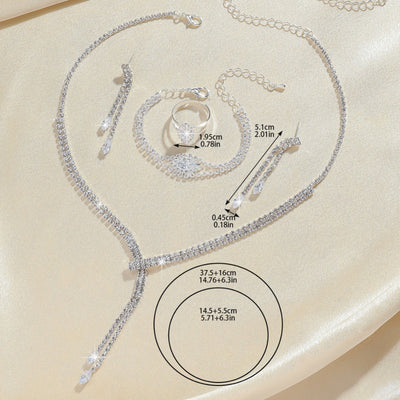 Sparkling rhinestone necklace, dangle earrings, and bracelet set on a black display, perfect for formal events. - Image 4