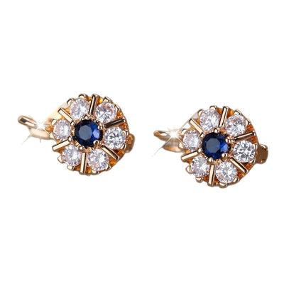 Aretes Flor de Zirconia Blanca y Zafiro Azul - Image 5