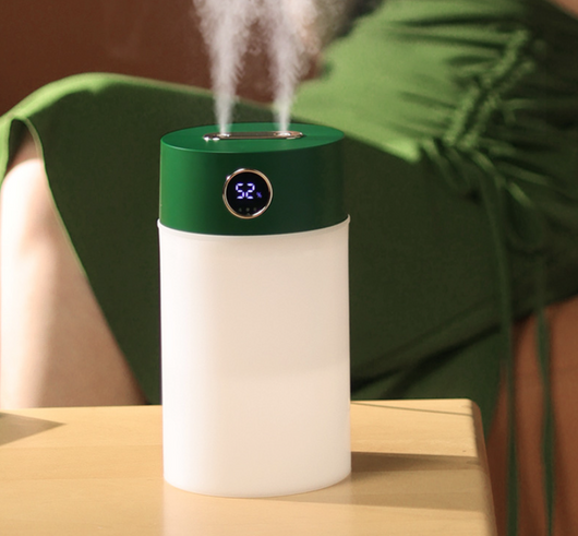 White cylindrical humidifier with a gold nozzle emitting mist, featuring a subtle bear emblem. Includes five aromatherapy oil bottles. - Image 16