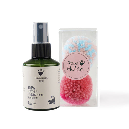 Two fluffy cat pom-pom toys, one pink and blue, one pink, in a clear box with a small bottle of catnip hydrosol. - Image 9
