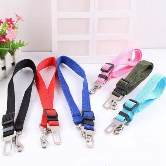 Pink adjustable dog car seat belt with a metal seatbelt buckle and a silver swivel snap hook. - Image 9
