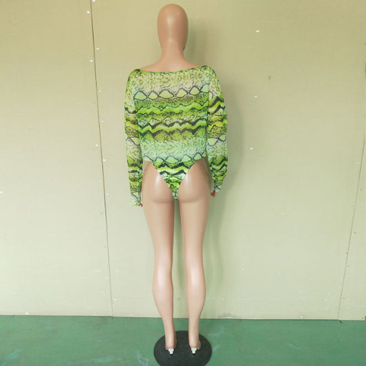 Woman in a purple and pink snakeskin print three-piece swimsuit with an off-shoulder crop top and high-waisted bottoms. - Image 23