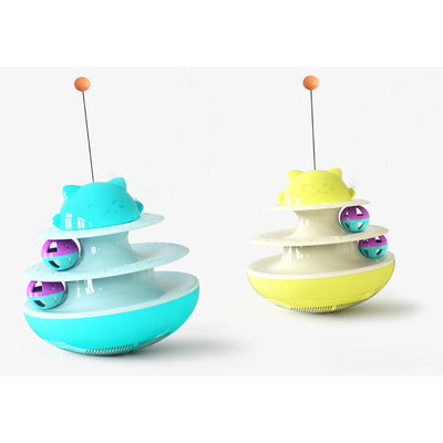 A playful kitten stands on its hind legs, batting at a dangling toy attached to a green and white multi-level cat track toy with rolling balls. - Image 10