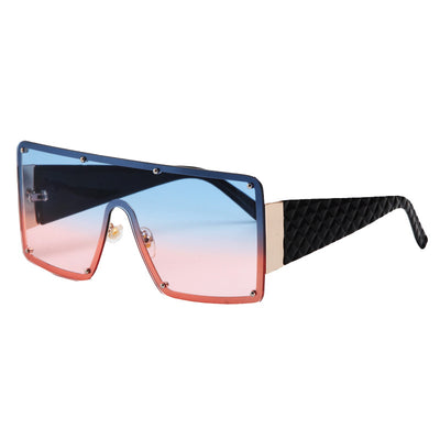 Oversized square frame sunglasses with brown gradient lenses and tortoise shell arms featuring a textured diamond pattern. - Image 9