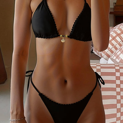 Black two-piece bikini swimsuit set with triangle top, shell pendant, and tie-side ruched bottoms with ruffled trim. - Image 4