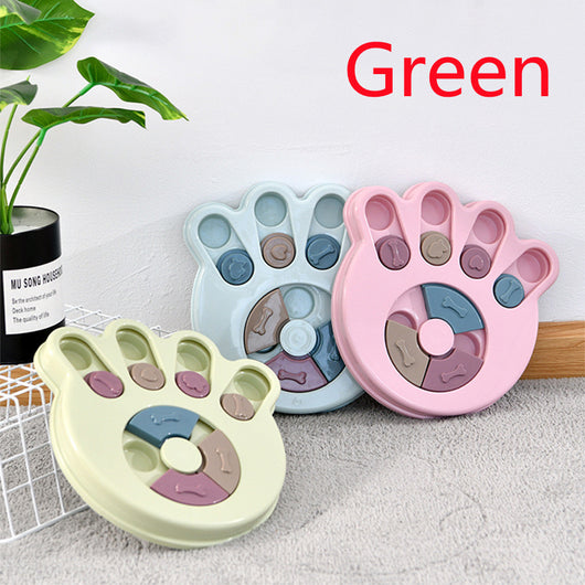 Paw-shaped dog puzzle feeder toy in light yellow with colorful sliding covers, filled with kibble. - Image 12