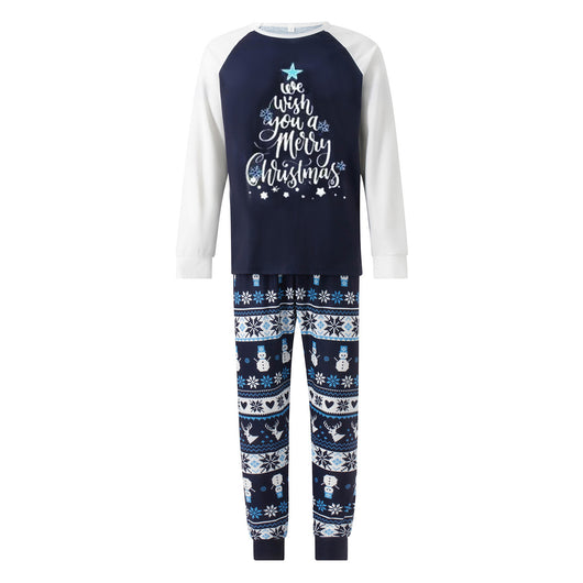 Matching family pajamas with navy blue and white raglan tops featuring a 'Let it Snow' graphic and snowman hat. Bottoms have a festive pattern of snowflakes, sn - Image 6