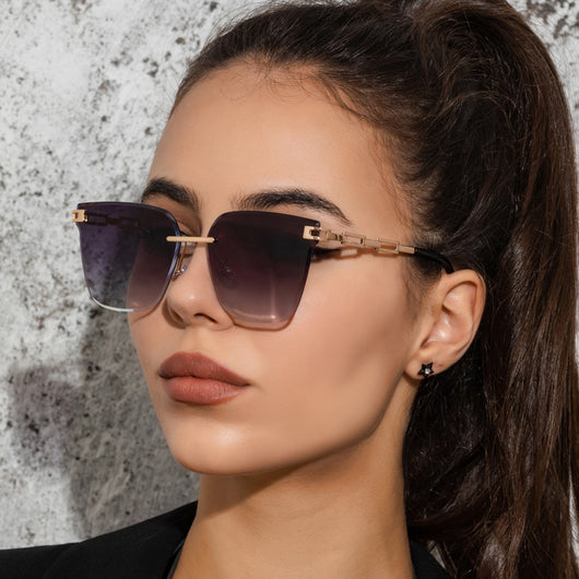 Frameless oversized square sunglasses with brown gradient lenses and gold-tone metal temples, featuring decorative black studs. - Image 2