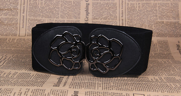 Red elastic women's belt featuring a prominent black alloy rose-shaped double buckle, suitable for various outfits.