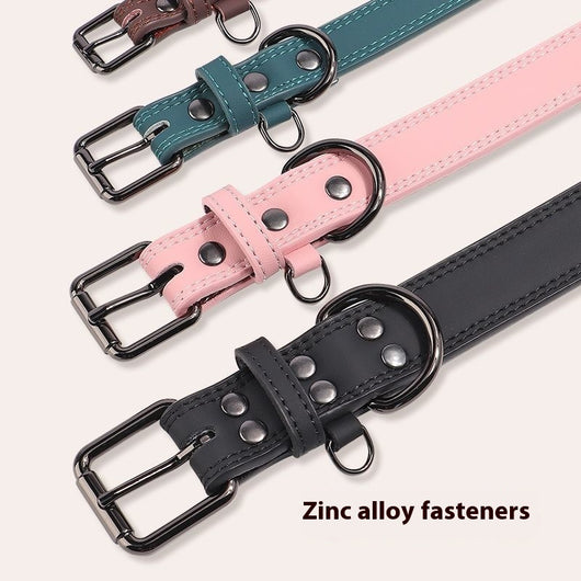 Teal leather pet collar with white stitching, dark metal buckle, and D-ring, displayed on a brown surface. - Image 3
