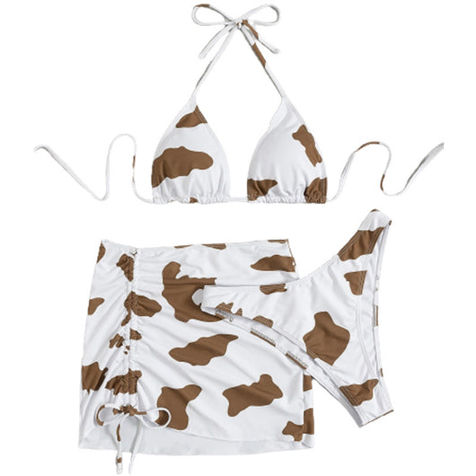 Women's three-piece cow print swimsuit with a white and brown triangle bikini top and a ruched mini skirt. - Image 16