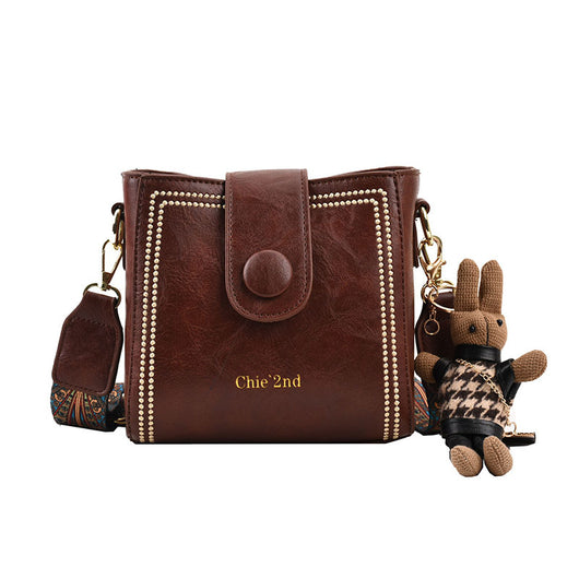 Bolsa Mensajera Retro con Textura Premium - Image 8
