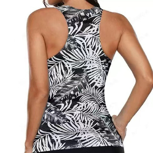 Women's black and white tropical leaf print tankini top with a black center panel and black swim bottoms. - Image 5