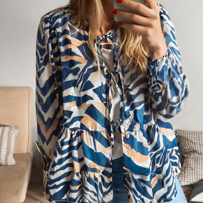 Blusa de Rayas Zebra Azul con Mangas Abullonadas