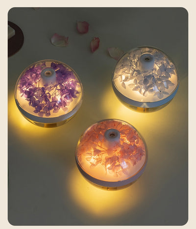 Pink round mini humidifier with clear dome, decorative pink flowers, and a light-up base, ideal for desktop or bedroom. - Image 14