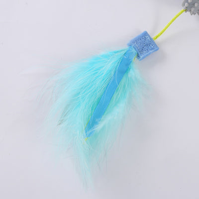Gray suction cup cat toy with a textured top and two blue and yellow feathered wands attached by green cords. - Image 6