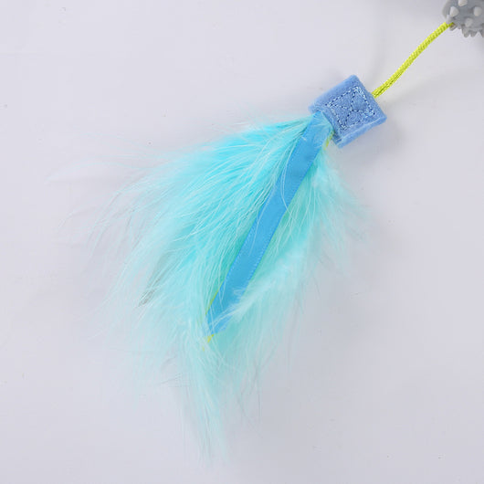 Gray suction cup cat toy with a textured top and two blue and yellow feathered wands attached by green cords. - Image 6