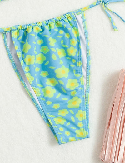 Lace-up sexy bikini with light blue and yellow floral print, featuring a triangle top and string tie bottoms. - Image 7