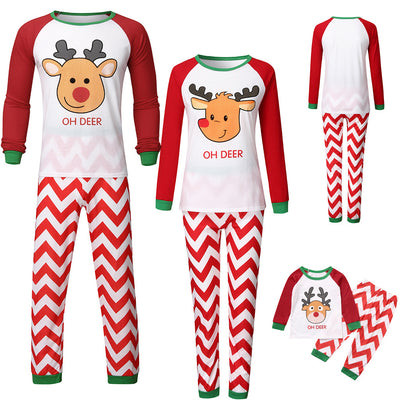 Red and white parent-child pajama set with a reindeer graphic top and chevron stripe pants, green cuffs. - Image 12