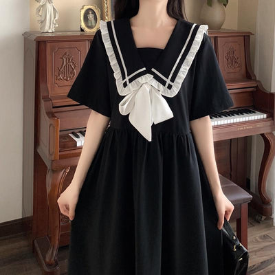 Vestido Navy con Cuello y Diseño Patchwork Manga Corta - Image 9