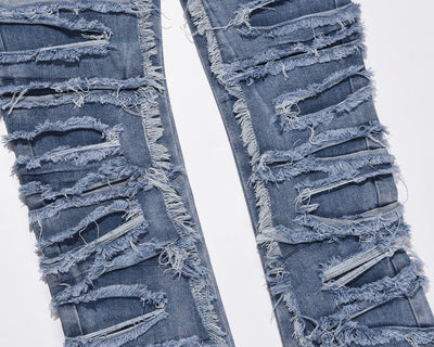 Jeans Azul Rotos con Parches y Detalles Desgarrados - Image 5