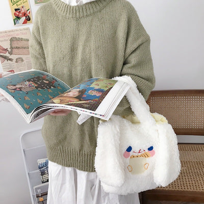 Bolsa Portátil con Orejas Largas - Diseño Versátil y Compacto - Image 11