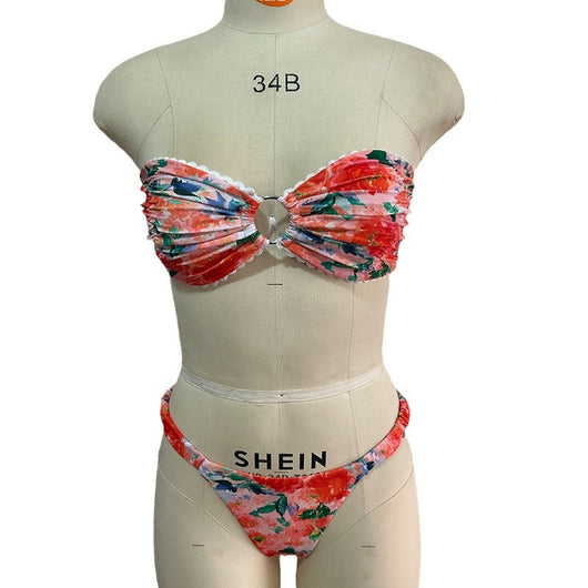 Floral print tube top bikini with blue and purple flowers, white lace trim, and a central ring detail. - Image 3