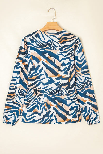 Blusa de Rayas Zebra Azul con Mangas Abullonadas - Image 2