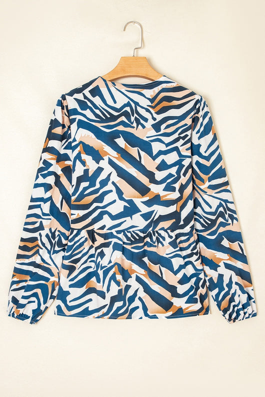 Blusa de Rayas Zebra Azul con Mangas Abullonadas - Image 2