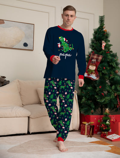 Blue baby long-sleeved pajama set with red trim, featuring a Christmas dinosaur wrapped in lights and "baby" text. - Image 9